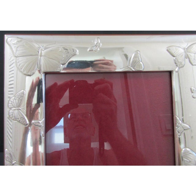 The Marcello Giorgio for Neiman Marcus 136 MC 925 Sterling Silver Butterfly Frame is a stylish and elegant photo frame...