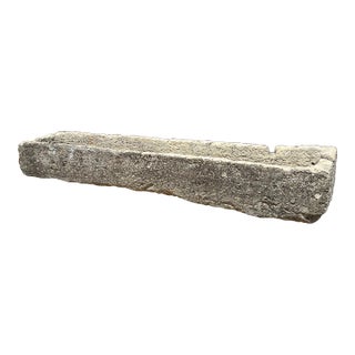 A Long 18th Century Carved Limestone Trough From the South of France For Sale