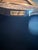 Seat height 32” Chair back 50” Seat width 24” Distressed leather back Paisley textured velvet seat Rich dark brown wood...