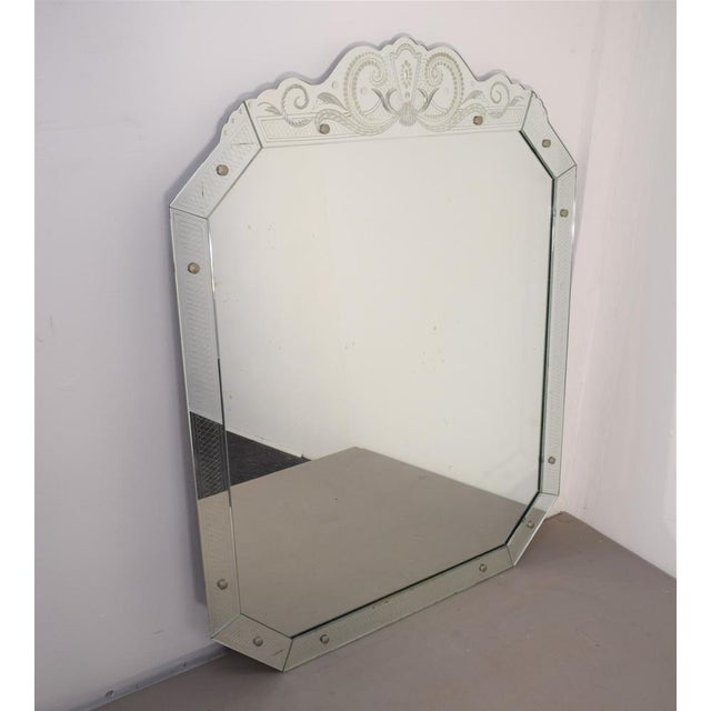 Great mirror of pietro chiesa, italian production of the 1950s. mirrored crystal and wood. good condition, small...