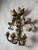 An elegant pair of Italian wall sconces in gilded brass, dating from the 1950s, in the style of the renowned Banci Firenze...