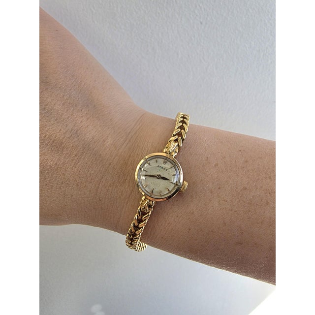 Vintage Rolex Orchid ladies cocktail watch in 18K yellow gold with a woven gold bracelet, circa early 1950s. An elegant...