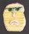 A 1970s ceramic tile by the American artist Mark Bulwinkle (born 1946). This ceramic piece depicts an abstract face made...