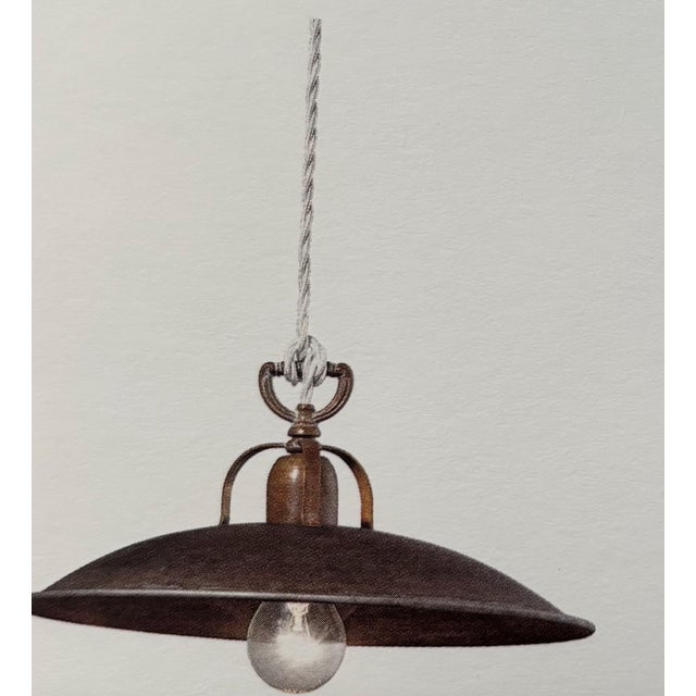 Antiqued brass fixture with clean lines to define a collection of ease and precision. Vintage Style Ajustable Height