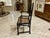 Early 20th Century Antique Art Nouveau Ladderback Black Dining Side Desk Hall Arm Chair W/Cane Seat 41“ Tall For Sale - Image 5 of 9