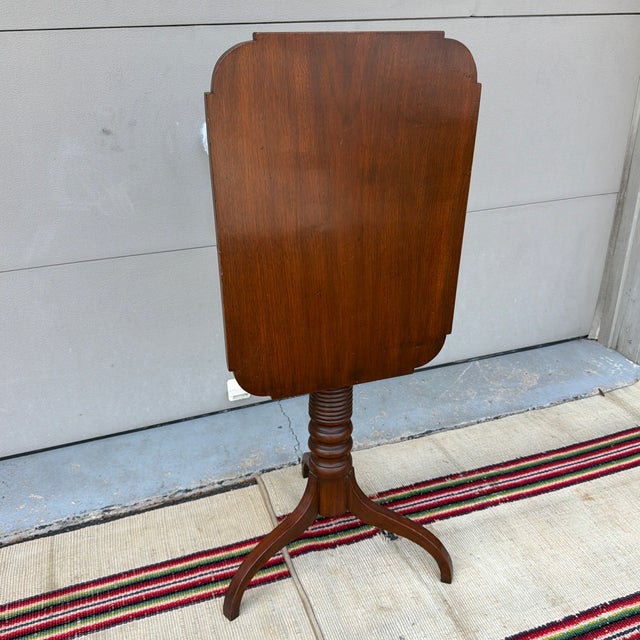 Antique Pennsylvania Walnut Federal Tilt Top Spider Leg Candlestand, Chester County, Circa 1820s A wonderfully distinctive...