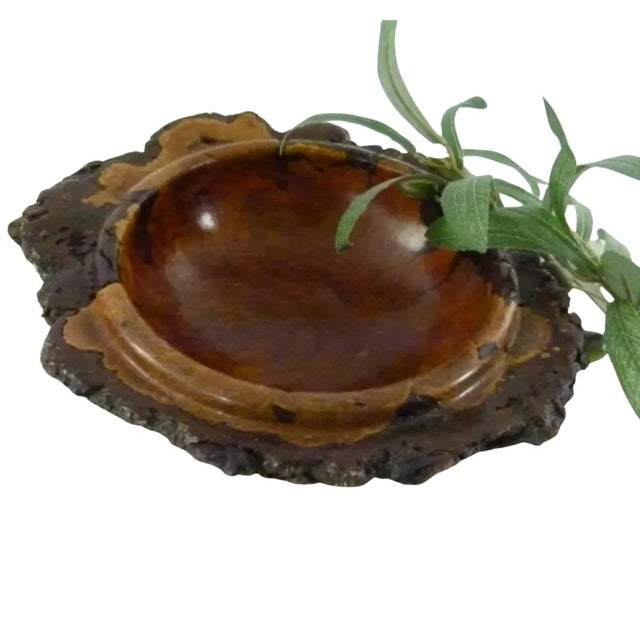 This live-edge Cherry Burl bowl is by Hoyt G. Brown a North Carolina wood turner and second-generation Appalachian...
