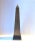 A single brass and wood Obelisk, in the Modern style, circa late-20th century. A great decorative object, statement piece...