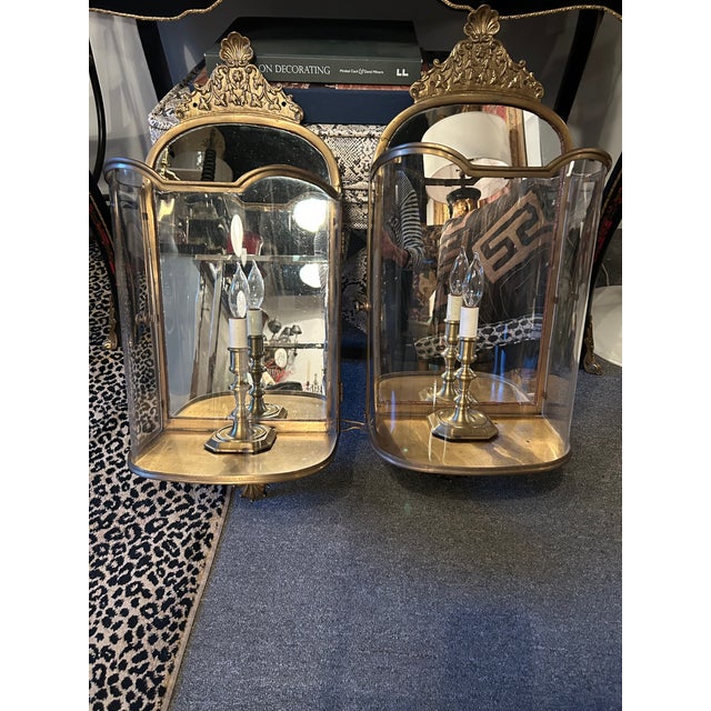 Impressive large pair of Vaughn brass and curved plexiglass wall lanterns having electrified candle inside each with...