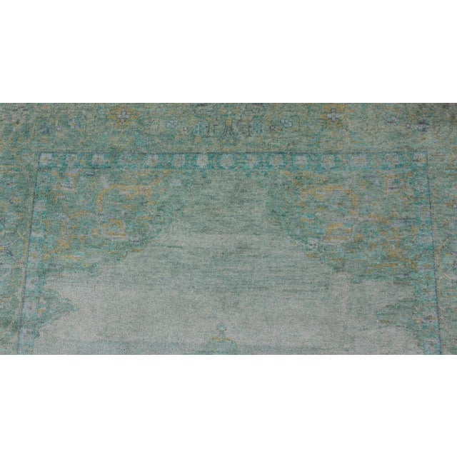 Modern Oushak Rug With Floral Medallion Design in Various Shades of Green 6'7" X 9'2" For Sale - Image 10 of 11