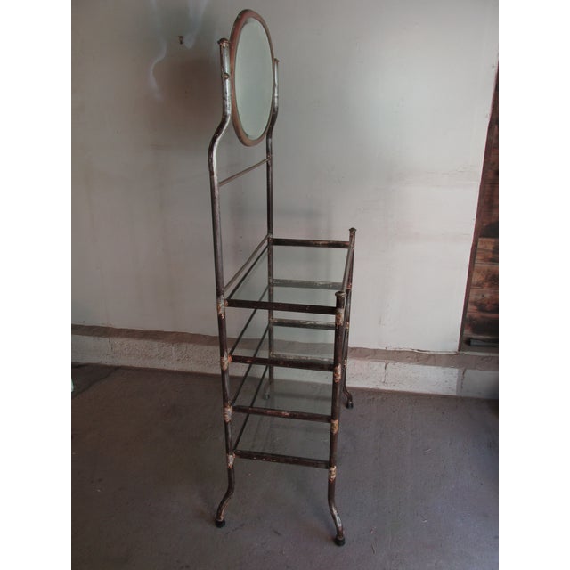 Etagere with mirror circa 1930. Possibly originally for institutional use. Features steel frame with brass couplings....
