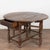 18th century Portuguese chestnut drop leaf dining table which may also serve as a console. This form includes a single...
