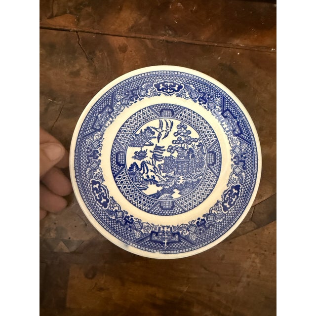 A classic set of five Blue Willow saucers featuring the timeless blue and white transferware pattern that has remained...