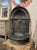 This rare 19th century Belgian black marble wall fountain is a stunning outdoor water feature that adds a touch of...