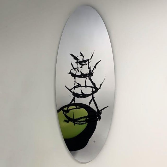 Dino Gavina wall object Scolabottigle from 1987 with silkscreen of a bottle rack on mirrored acrylis glass – a postmodern...