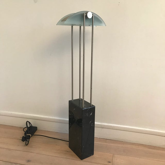 Rare pair of Pierre Lallemand Moonlight lamps circa 1980-1990 black marble stand, stainless steel baffle structure with...
