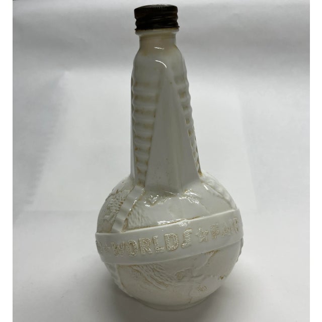 1939 - 1940 New York World's Fair vinegar bottle with lid. Milk glass.