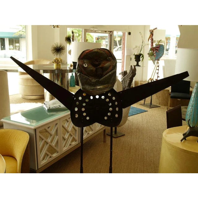 Offered is a a great sculpture circa 1989. This piece consists of different metal pieces are attached to 2 bars and placed...