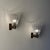 A remarkable pair of large wall sconces designed by ercole barovier for barovier & toso in the 1940s, showcasing the...