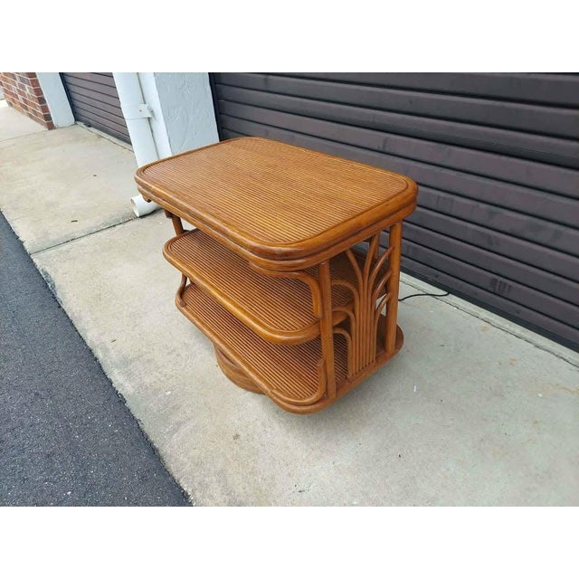 1980s Vintage Mid Century Modern Rattan 3 Tier Revolving Table / Tv Stand 3 Pencil Reed Rattan Shelves. For Sale - Image 5 of 10