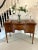 Antique mahogany serpentine shaped sideboard having a quality mahogany serpentine shaped top, bow fronted door to the...