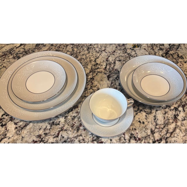 99 piece total set. Noritake Damask pattern #5698: Sabrina. Discontinued. Elegant wide gray band with intricate white...