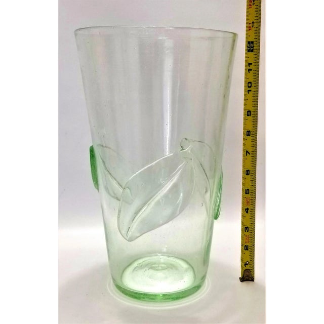 Offering a large vintage light green Blenko glass vase with applied leaves, circa 1960s. As you can see from the photos,...