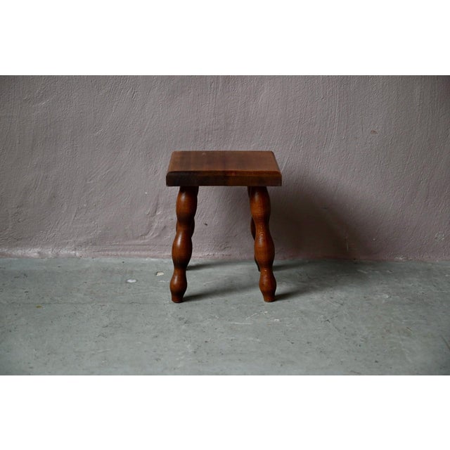 This small wooden stool is one of those authentic, rustic pieces of furniture that we love. Its shape is simple and...