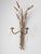 An authentic Mid Century Italian tole candle sconce with wheat motif and two candle holders.