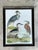 This grand-scale vintage ornithological print captures the timeless beauty of the natural world, rendered in the classic...