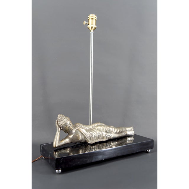 Important Silvered Bronze Buddha Lamp on a Black Marble Base, Former French Indochina, Circa 1930–1940 Elegant and rare,...