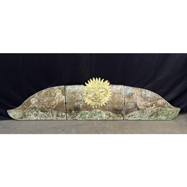 This three-panel concrete frieze is a genuinely unusual garden antique, with a polychrome relief composition centered on a...