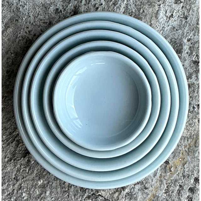 Elevate your serveware collection with this stunning set of five Vintage Asian Glazed Ceramic Stacking Bowls. Each bowl...