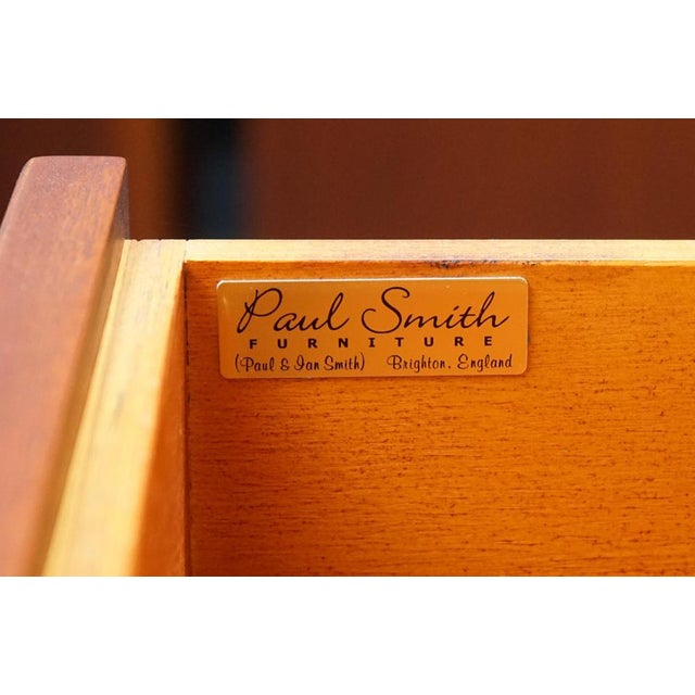 This impressive pair of large chests of drawers is crafted in the elegant Edwardian style and made by Paul Smith of...