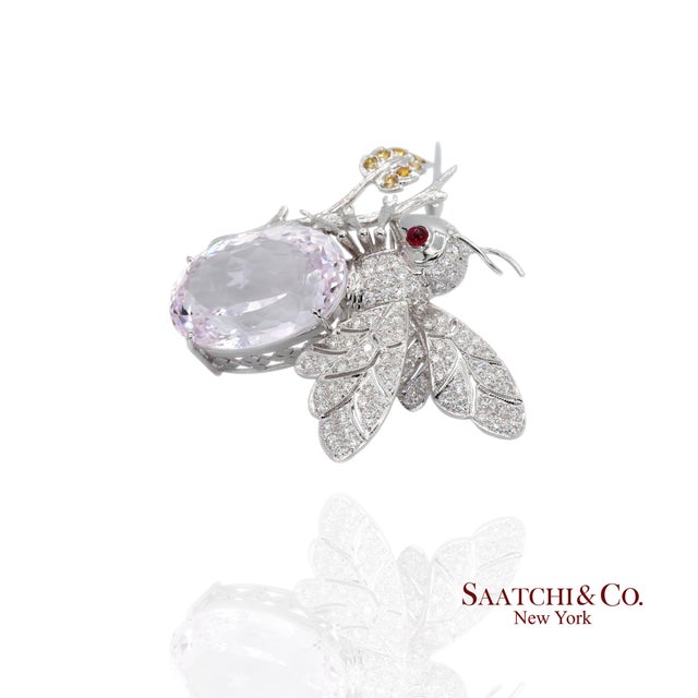 Diamond and Kunzite Brooch Total Item Weight: 20.6 Grams Metals and Materials: 18k Gold Dimensions: Length: 43.0 mm X...