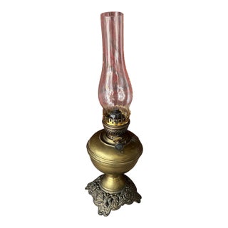 1900s Victorian Brass Oil Lamp With Ornate Base & Clear Glass Chimney For Sale