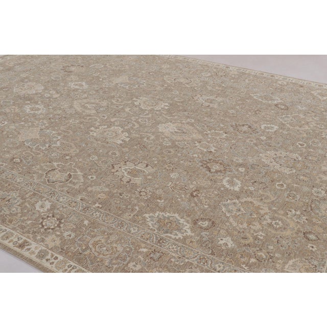 Hand-knotted in wool, this 10x14 rug is inspired by antique Agra rug styles and is the latest exciting addition to Rug &...