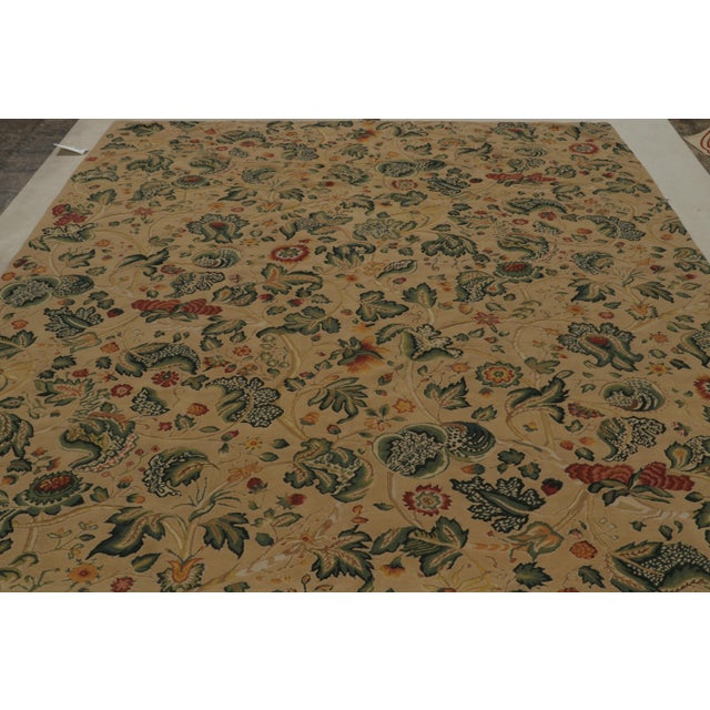Handwoven in wool, this 9x10 European flatweave rug has been inspired by 18th century English Tudor rugs and tapestries....