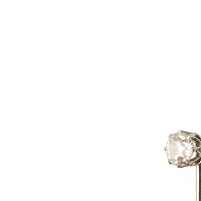 Jewelry - Tie brooch; in 19.2K gold with diamond. Portuguese from the first half of the 20th century; in 19.2 kt white...