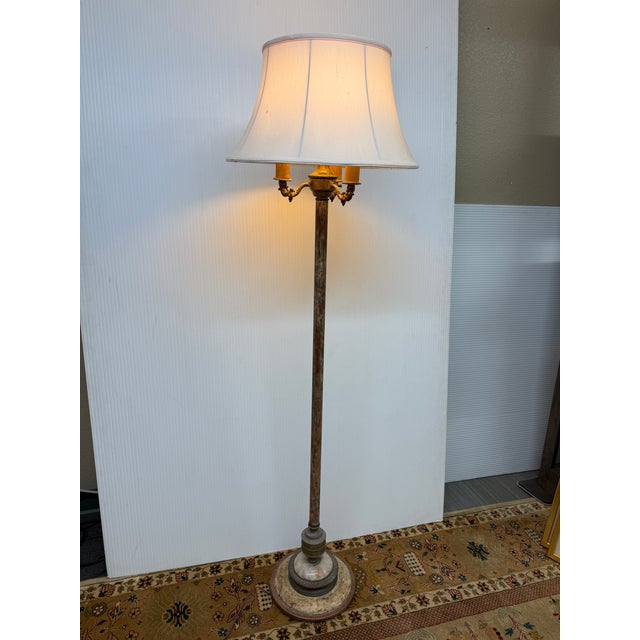Design Plus Gallery presents a Torchiere Lamp with French Provincial Style. A lamp is tall and slender floor lamp with an...