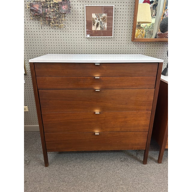 You are viewing a fantastic Knoll 5 Drawer Walnut + White Laminate Chest, designed by Florence Knoll c1960. The classic...