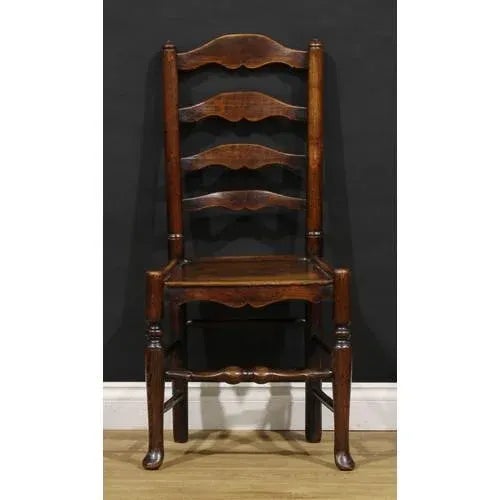 A set of four early 19th century English vernacular ash ladderback side chairs, probably Lancashire, panel seats, circa...