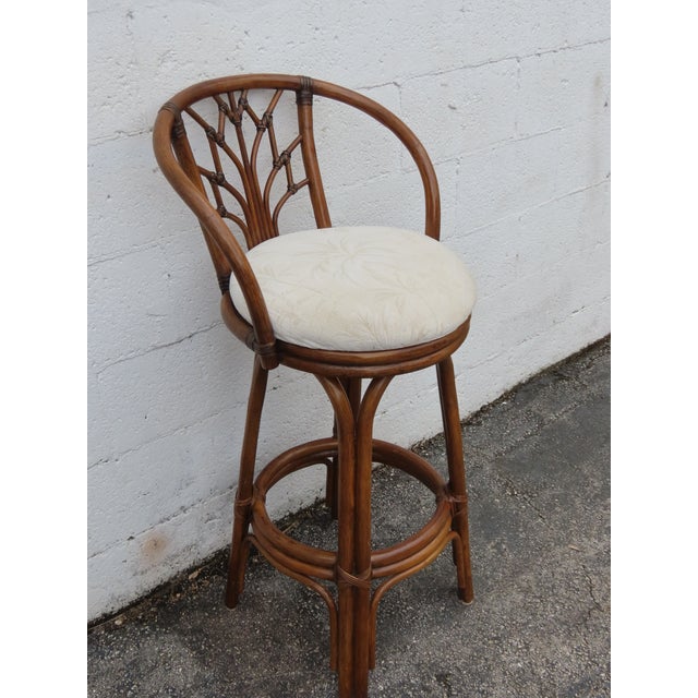 This beautiful Bar Stools is made of bamboo, rattan, and upholstery. This Set of 4 Swivel Bar Stools are a brilliant...