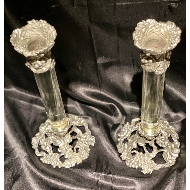 Pair of Lucite and Pewter Candle Holders measure 11" High and 4.50 Wide at the Base.. The Pewter is twisted into intricate...