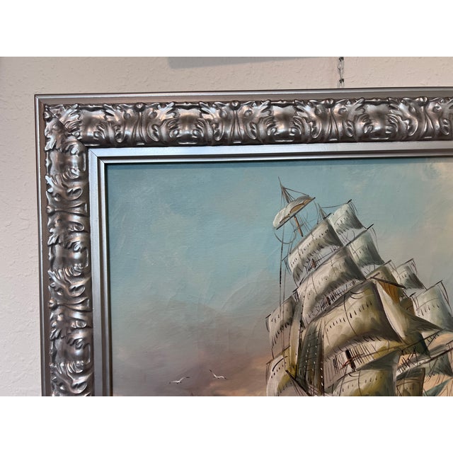 This original vintage oil painting presents a dramatic European marine scene featuring a powerful tall ship navigating...