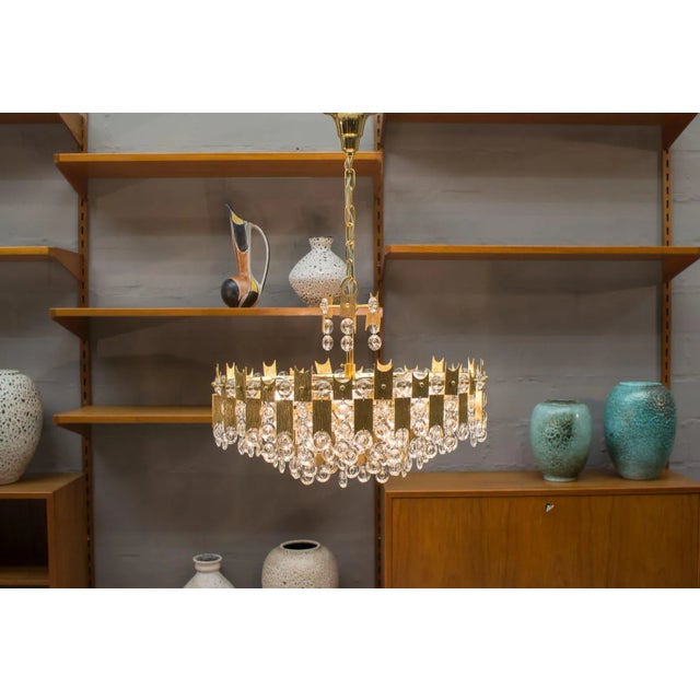 Large Gilt Bronze and Crystal Glass Chandelier from Palwa, 1970s, in Very Good conditions. Designed 1970 to 1979 I have...