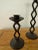 A trio of brutalist style metal candleholders, heavy and solid. Bottoms are felt-lined. Shortest is 6.5”H and tallest is...