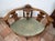 A finely carved Neo-Renaissance tete-a-tete sofa in walnut dating from the late 19th century. The backrest and armrests...