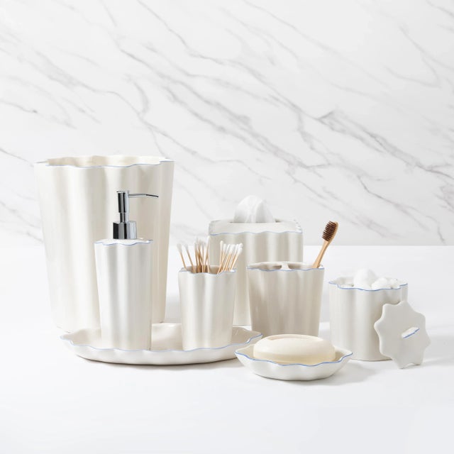 Crafted from porcelain and featuring a whimsical scalloped design, the Le Marais collection is an elegant addition to any...