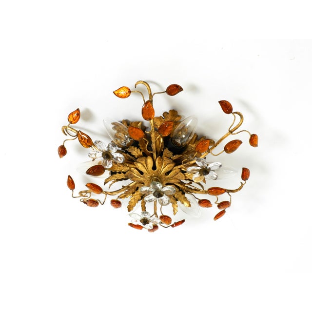 Elegant and rare 1960s florentine-style ceiling or wall lamp. Manufacturer: banci firenze. Made in italy. a highly refined...